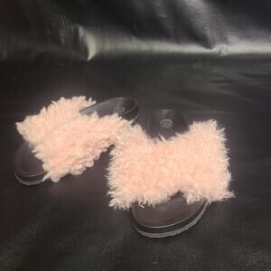 Urban Outfitters pastel pink faux lamb slides size 7